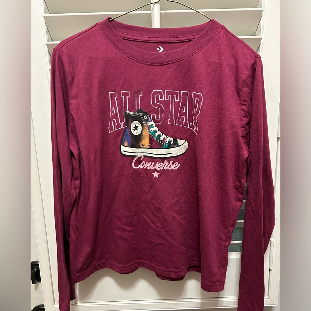 Never worn converse long sleeves girls shirt. Size XL